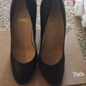 Christian Louboutin wedges .